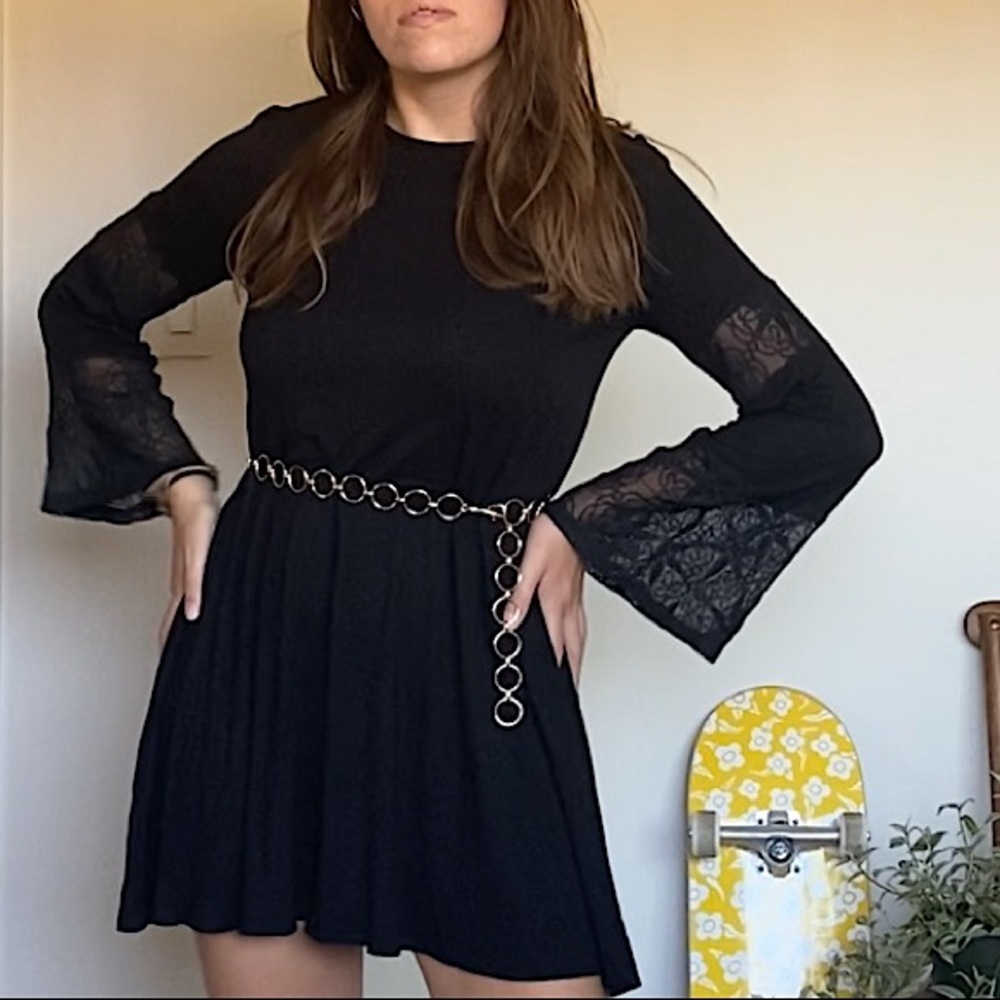 black lacy bell-sleeved dress
